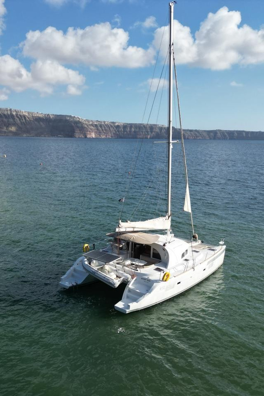 Santorini: Catamaran Cruise with Greek BBQ and Drinks - The Caldera Hot Springs: Mineral Water, Sulphur Smell, and 30 Minutes of Being Human