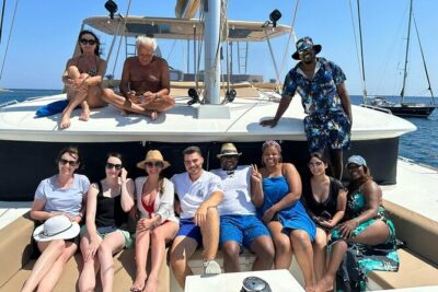 Santorini Catamaran Cruise: with Lunch, BBQ, Open Bar, Transfers - What you see while sailing: White Beach, Indian Rocks, and the Venetian Lighthouse