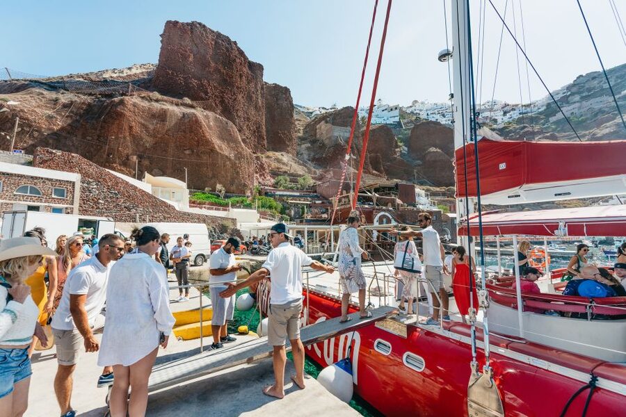 Santorini: Catamaran Tour with BBQ Dinner, Drinks, and Music - Red Beach Stop: 30 Minutes That’s Just Enough