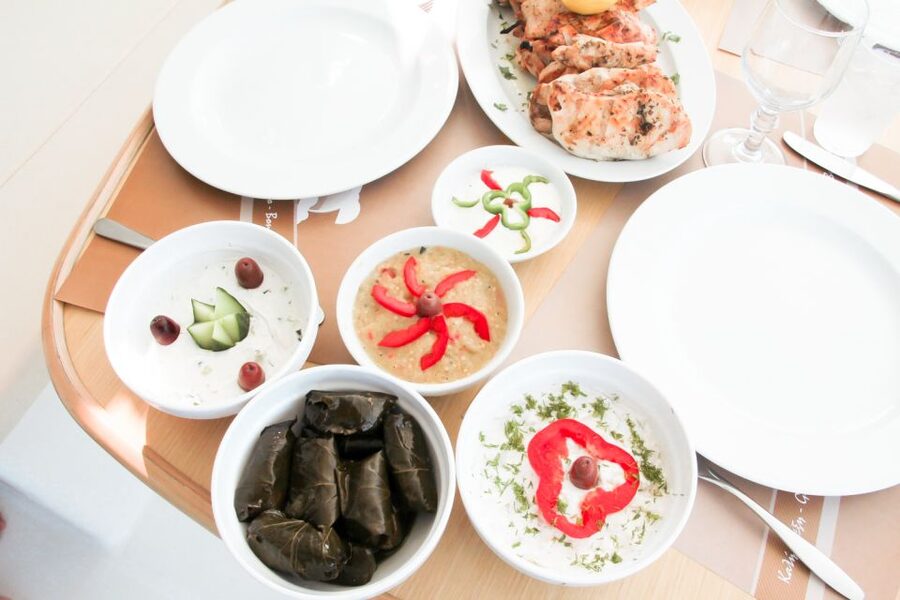 Santorini: Catamaran Tour with BBQ Meal and Unlimited Drinks - Red Beach snorkeling: what to expect from the underwater stop