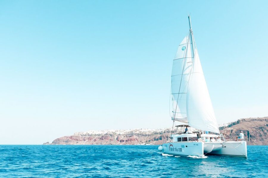 Santorini: Catamaran Tour with BBQ Meal and Unlimited Drinks - The Oia sunset option: why watching from the water feels different
