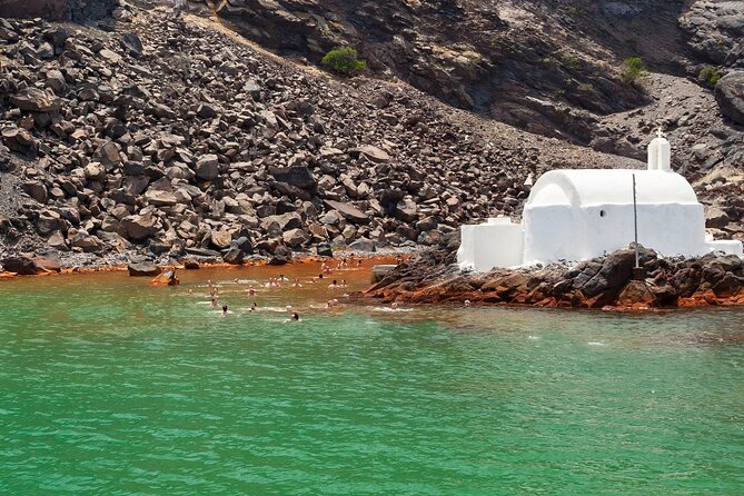 Santorini Classic Catamaran Cruise with BBQ, Drinks and Transfers - BBQ time at Nea Kameni: lunch with the caldera around you