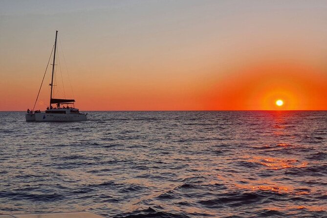 Santorini Classic Catamaran Cruise with BBQ, Drinks and Transfers - The caldera route: Red Beach and White Beach, minus the crowds on land