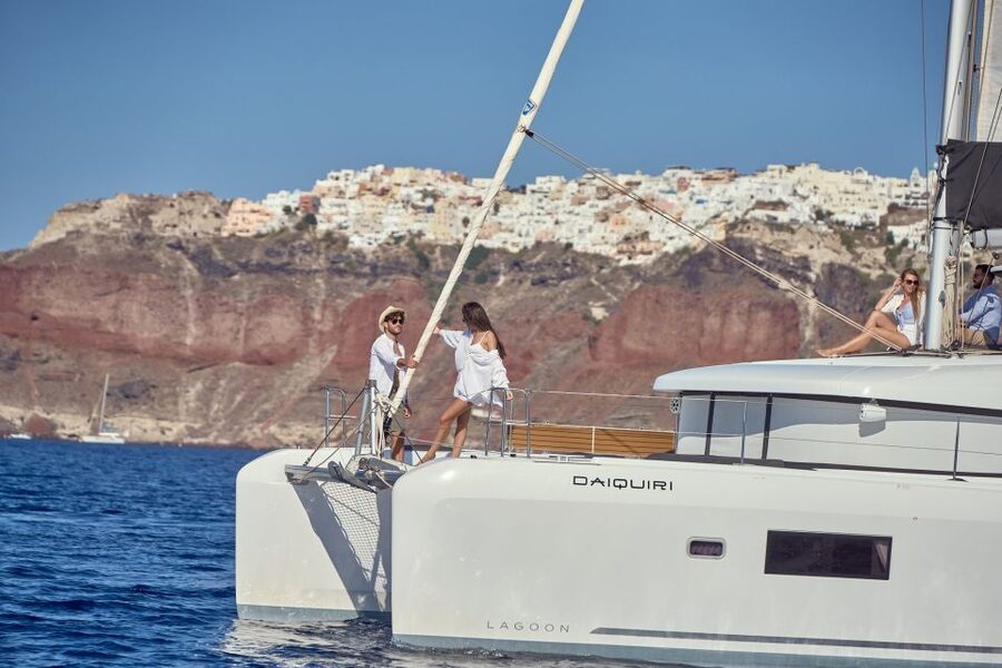 Santorini: Day Luxury Catamaran Cruise with Meal & Drinks - Thirassia Island: the first swim stop with clear, calm water energy