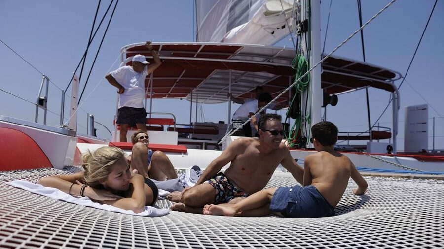 Santorini: Dream Catcher 5-hour Sailing Trip in the Caldera - Private swim bays and snorkeling: what the free time really means