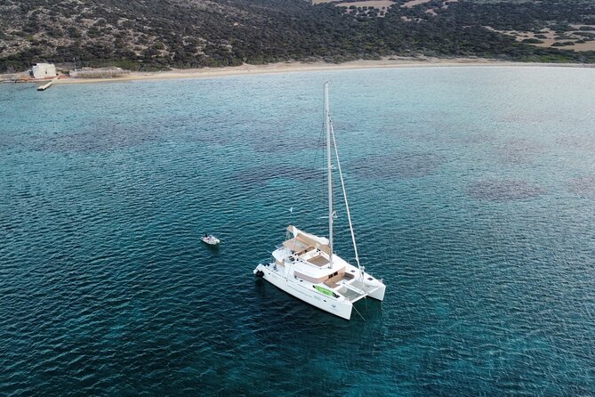 Santorini Gold Catamaran Cruise with BBQ, Drinks and Hotel Pickup - Sea Conditions, Safety, and Who Should Book