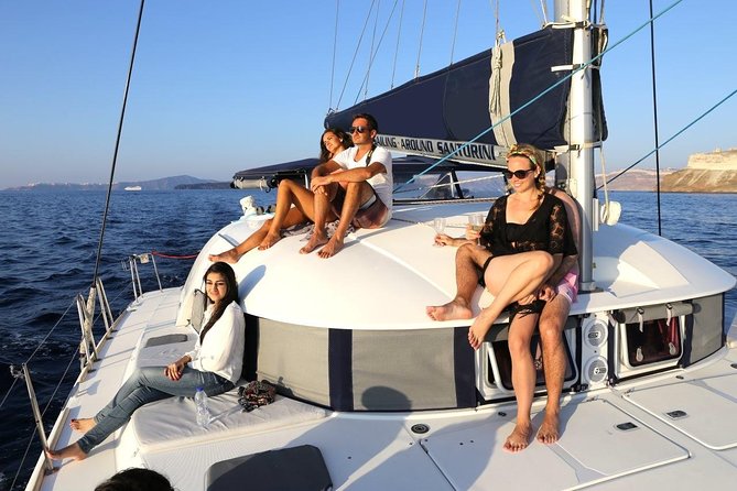 Santorini Half Day Catamaran Private Cruise incl. Meal, Drinks & Free Transport - Private catamaran from Vlychada: what makes it feel premium