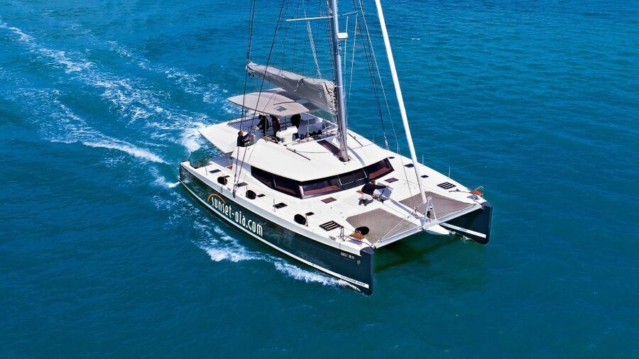 Santorini: Luxurious Catamaran Cruise with Meal & Open Bar - Hot springs swim time: fun water, sulfur rules, and a warm-weather mindset