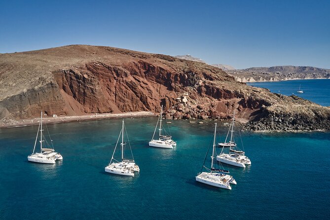 Santorini: Luxury Catamaran Cruise with Fresh Fish BBQ & Drinks - Nea Kameni and the Volcano Area: Sulfur Springs, Swimming Time, and Dinner