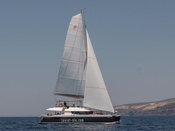 Santorini Luxury Catamaran Day Cruise with BBQ,drinks,transfer - Catamaran comfort and the small-group vibe