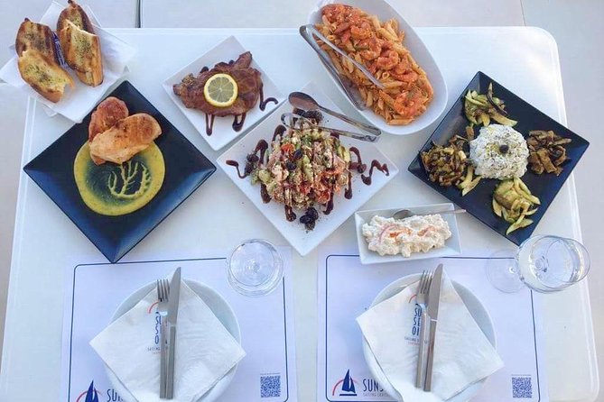 Santorini Luxury Catamaran Day Cruise with BBQ,drinks,transfer - Snorkeling gear, flotation help, and swim-stop habits