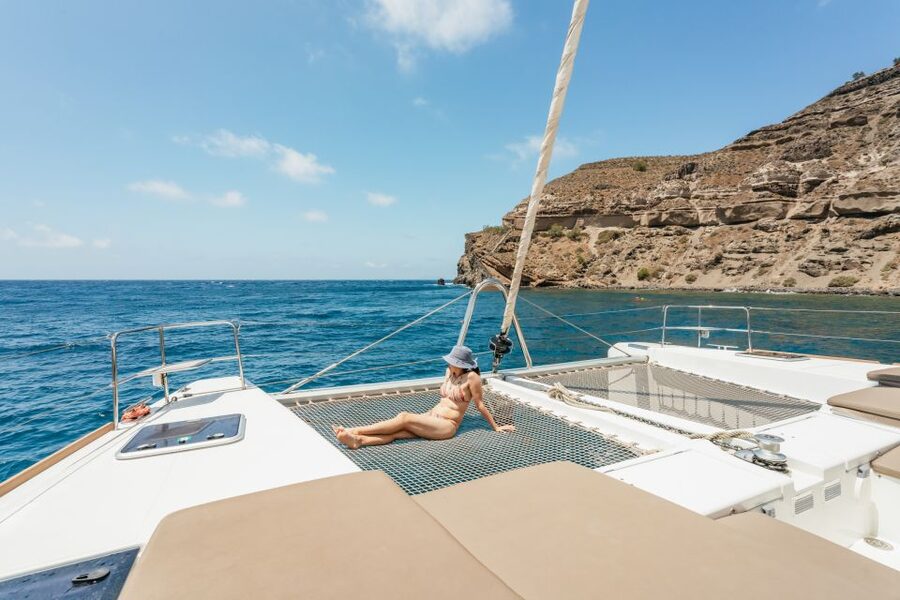Santorini: Luxury Catamaran Day Trip with Meal and Open Bar - The Core Itinerary: Red Beach, White Beach Caves, and Caldera Swim Time