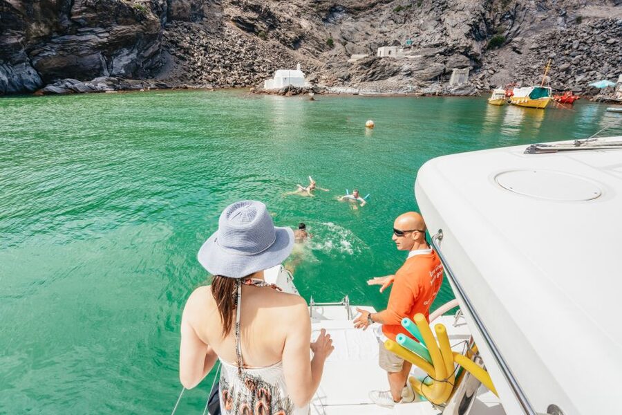 Santorini: Luxury Catamaran Day Trip with Meal and Open Bar - Around the Caldera: Volcano Islands, Fira Views, and Oia Sunset Lighting
