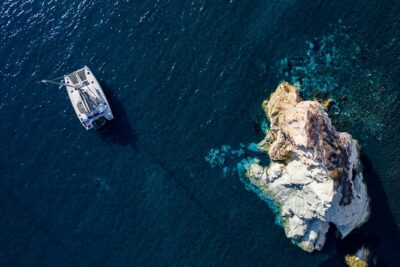 Santorini Platinum Catamaran Cruise with Meal, BBQ and Open Bar - Getting There: Vlichada Start Point and Pickup Reality
