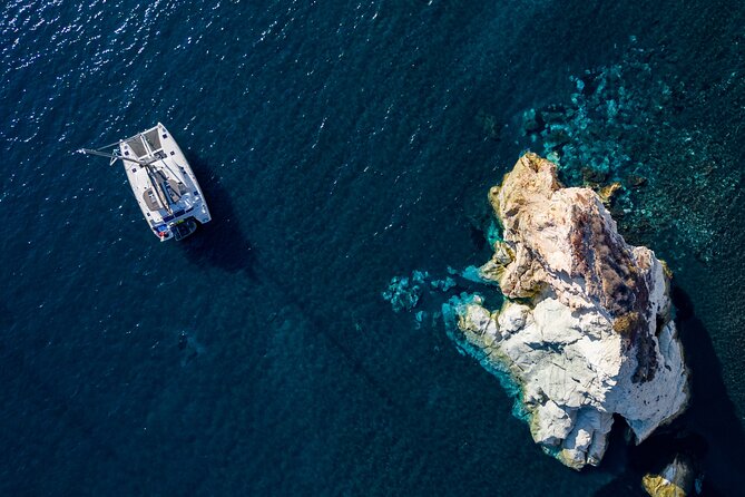 Santorini Platinum Catamaran Cruise with Meal, BBQ and Open Bar - Getting There: Vlichada Start Point and Pickup Reality