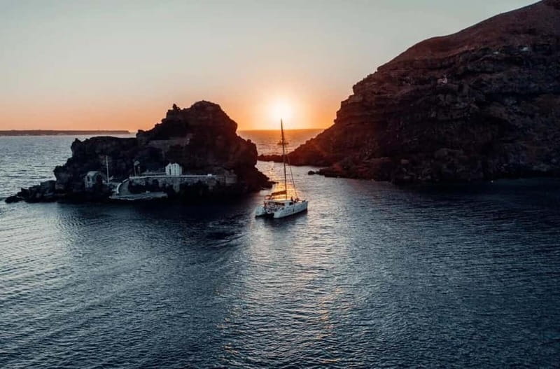 Santorini: Private Catamaran Cruise with BBQ Meal and Drinks - Leaving from Ammoudi Bay: the start that sets the tone