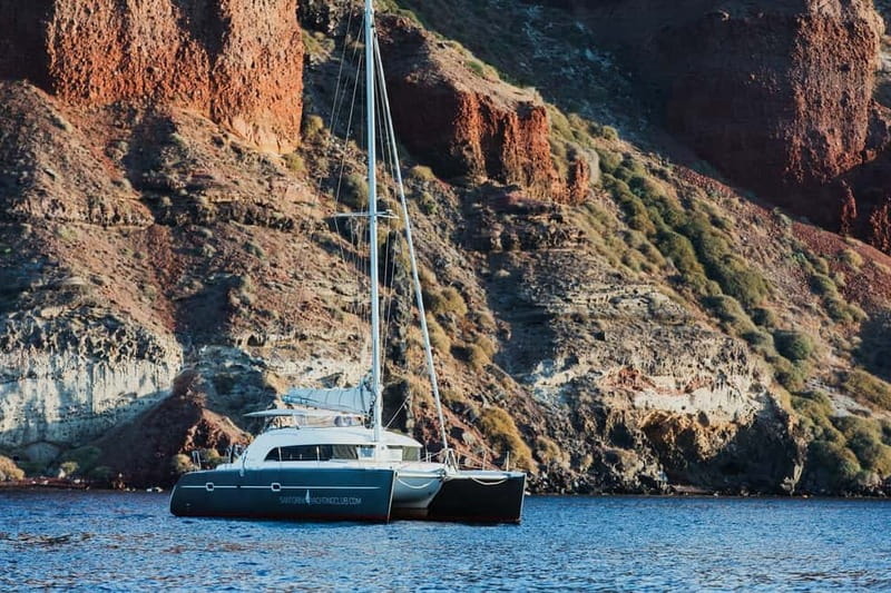 Santorini: Private Catamaran Cruise with BBQ Meal and Drinks - Volcano energy and the hot springs bath