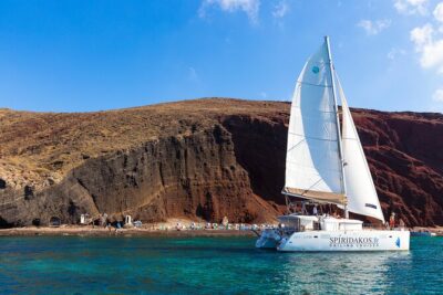 Santorini Private Catamaran Cruise with BBQ, Open Bar & Transfers - Red Beach Photos, Then Off to the Boat-Only White Beach