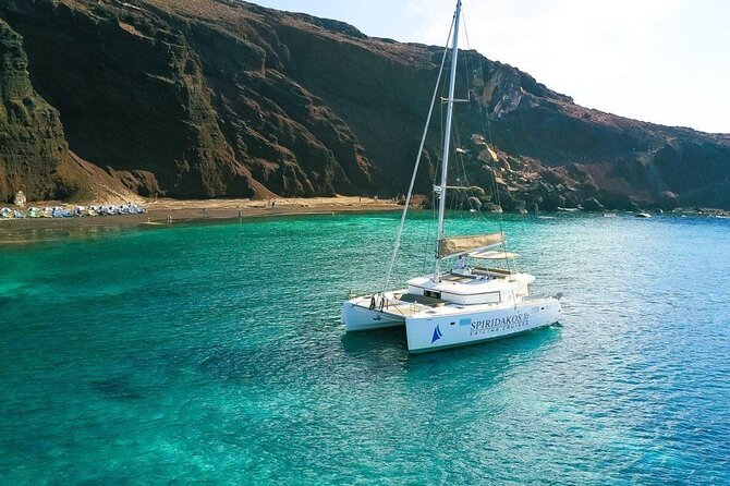Santorini Private Catamaran Cruise with BBQ, Open Bar & Transfers - BBQ, Local Wine, and Open Bar Without the Restaurant Line