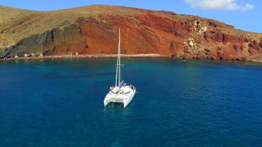 Santorini: Private Catamaran Cruise with Food & Drinks - Akrotiri Lighthouse and Indian Rock: views you notice right away