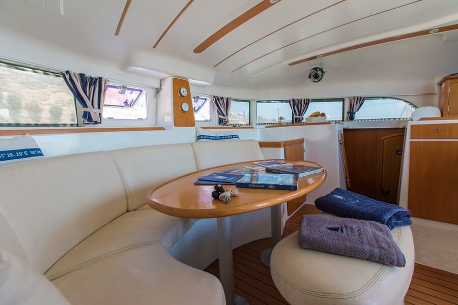 Santorini: Private Catamaran Cruise with Food & Drinks - Aspronisi and the volcanic zone approach