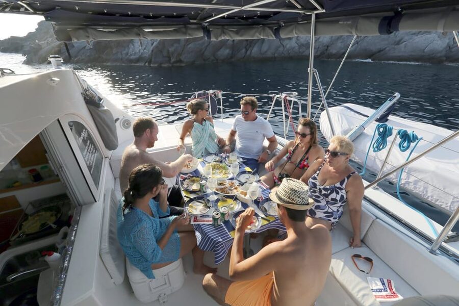 Santorini: Private Catamaran Cruise with Food & Drinks - Palea Kameni, Nea Kameni, and Santorini Volcano: the core swim experience