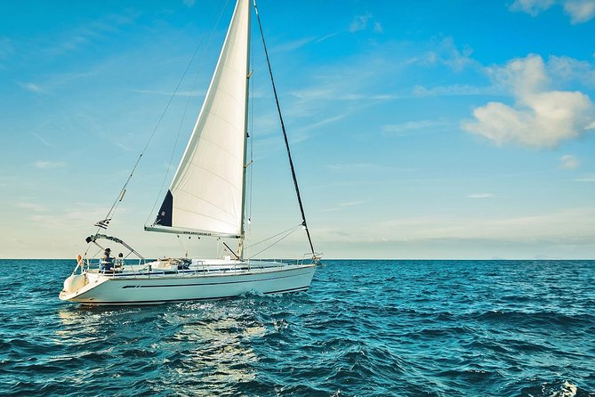 Santorini Private Daytime Sailing Cruise with Meal, Drinks &Transfer included - Crossing between volcanoes: lighthouse, hot springs, and that eastward wonder