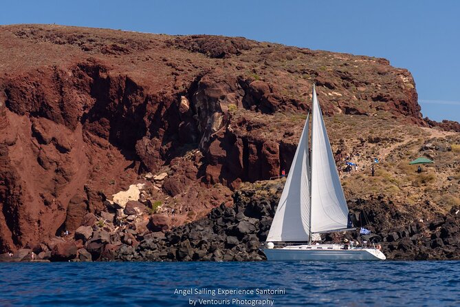 Santorini Private Sunset Sailing Tour with Dinner, Drinks &Transfer included - From the marina’s pumice shoreline to the island’s best angles
