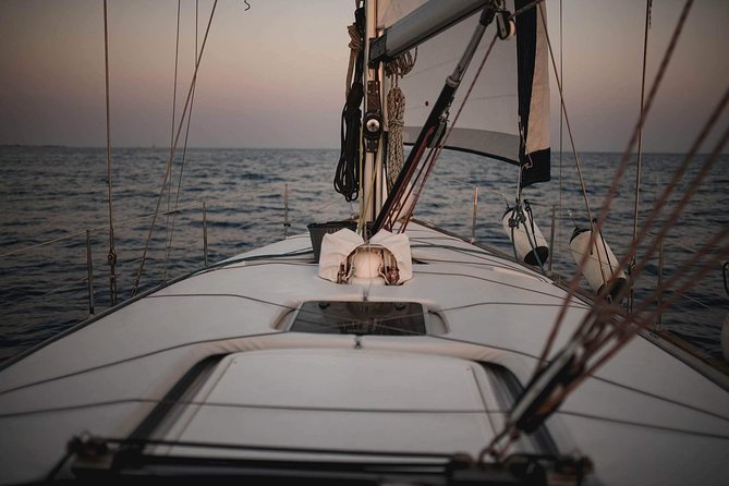 Santorini Private Sunset Sailing Tour with Dinner, Drinks &Transfer included - White Beach by boat: the coastline you can’t do the usual way
