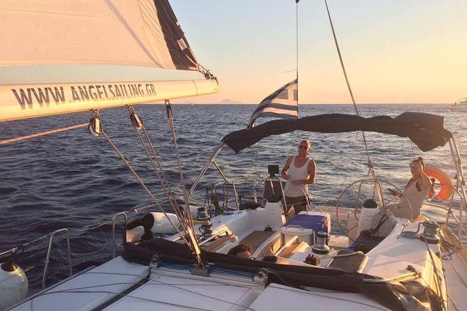 Santorini Private Sunset Sailing Tour with Dinner, Drinks &Transfer included - Thirassia Island at sunset: a calmer swim and an eastward view