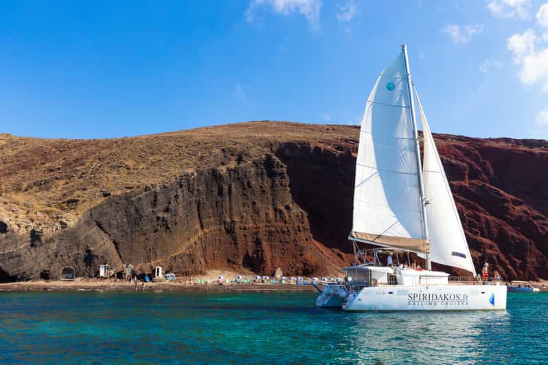 Santorini: Sailing Catamaran Cruise with BBQ and Drinks - From Thera to Vlychada Port: the ride and safety briefing flow