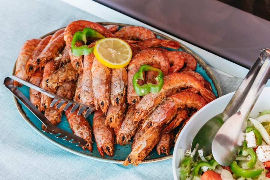 Santorini: Sailing Catamaran Cruise with BBQ and Drinks - Food and drinks on board: what’s included and what varies