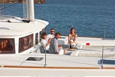 Santorini Small-Group Catamaran Sailing Trip(BBQ,drinks, transfer) - Red Beach swim stop: short time, big visuals