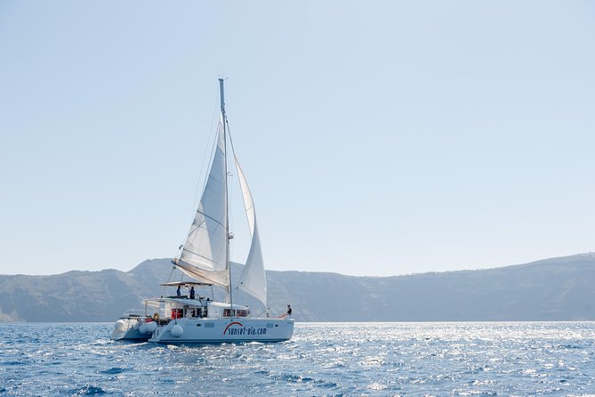 Santorini Small-Group Catamaran Sailing Trip(BBQ,drinks, transfer) - Hot springs swim near the volcano: mineral water, limited swimming time