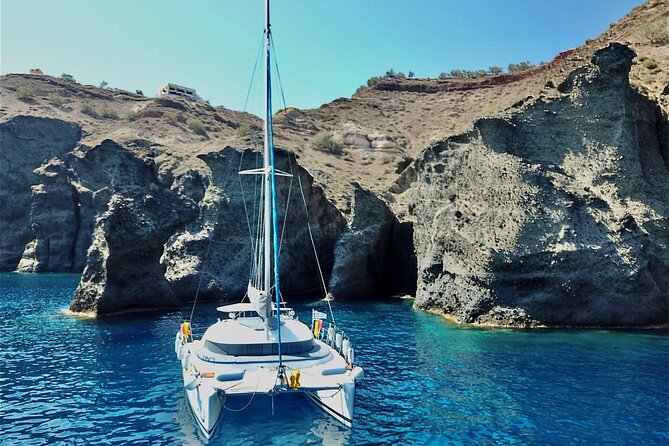 Santorini: Standard Small-Group Catamaran Cruise with Food/Drinks - Mesa Pigadia Beach: snorkeling time plus the BBQ buffet