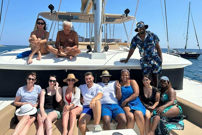 Santorini Sunset Sailing Cruise: Dinner, BBQ, Open Bar, Transfers - Sailing Highlights: White Beach, Indian Rocks, and the Venetian Lighthouse