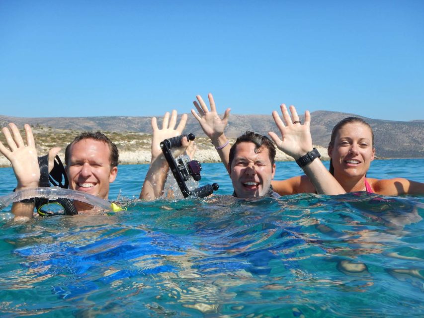 Semi-Private :Full-Day Sailing Tour Swim, Snacks & Drinks - The Take-Home Photos: Waterproof Camera and a DVD