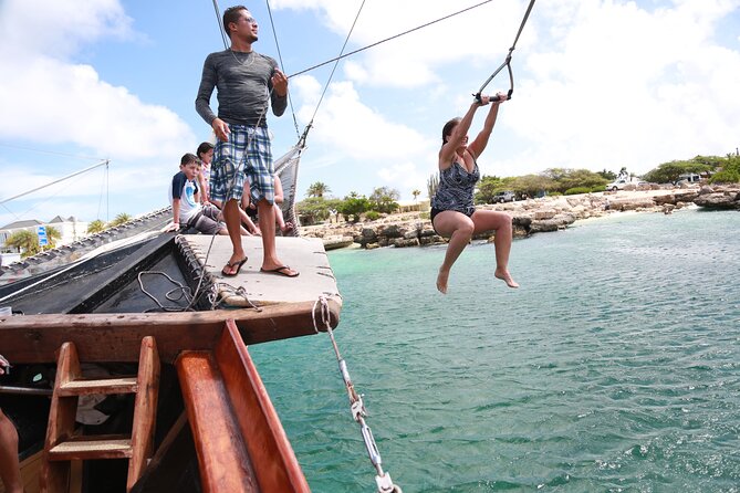 Set Sail in Aruba: Jolly Pirate Cruise with Snorkel Adventure - Rope Swing on a Pirate Ship: The Most Fun You Can Have, Safely