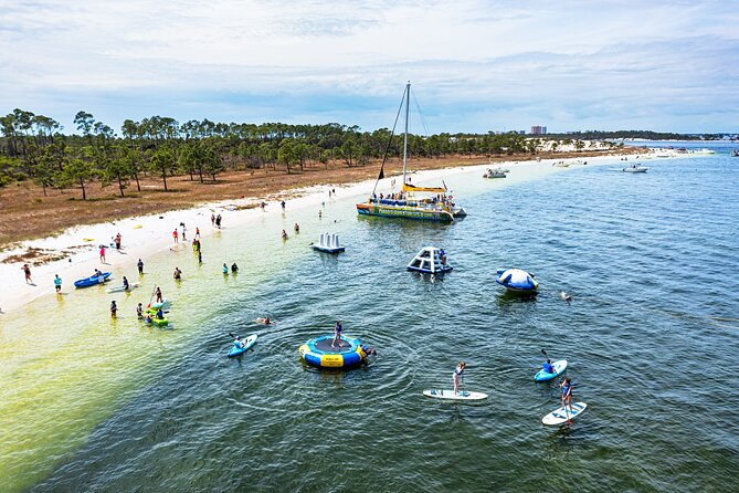 Shell Island Inflatable Adventure Park & Dolphin Sightseeing Tour - Why the Privateer Catamaran Makes Shell Island Simple