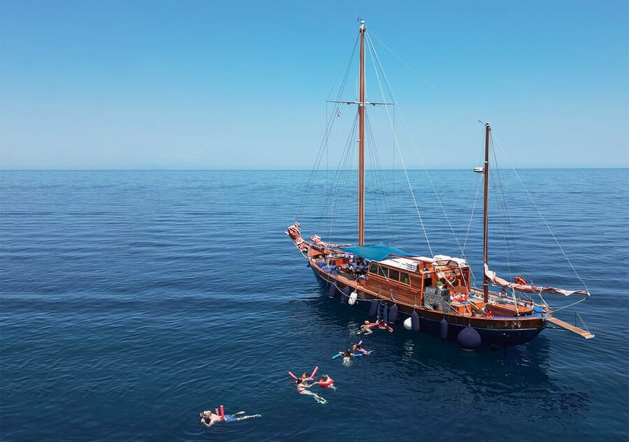 Skiathos: Wooden Sailboat Full- or Half-Day Trip with Meal - Entering the old port: finding the boat and getting settled