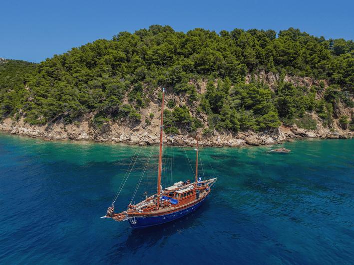 Skiathos: Wooden Sailboat Full- or Half-Day Trip with Meal - What the crew does beyond driving the boat