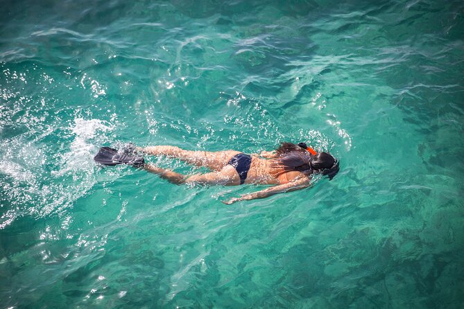 Small-Group Cruising and Snorkeling Catamaran Tour - The sandbar stop and floating bar: the most “vacation” moment