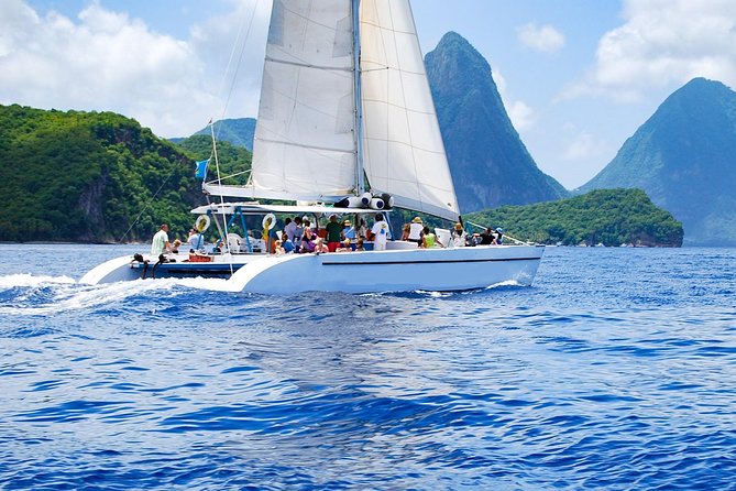 St Lucia Catamaran Day Sailing and Sightseeing Tour - Meeting the day at 8:10: pickup, the boat mood, and how long it takes