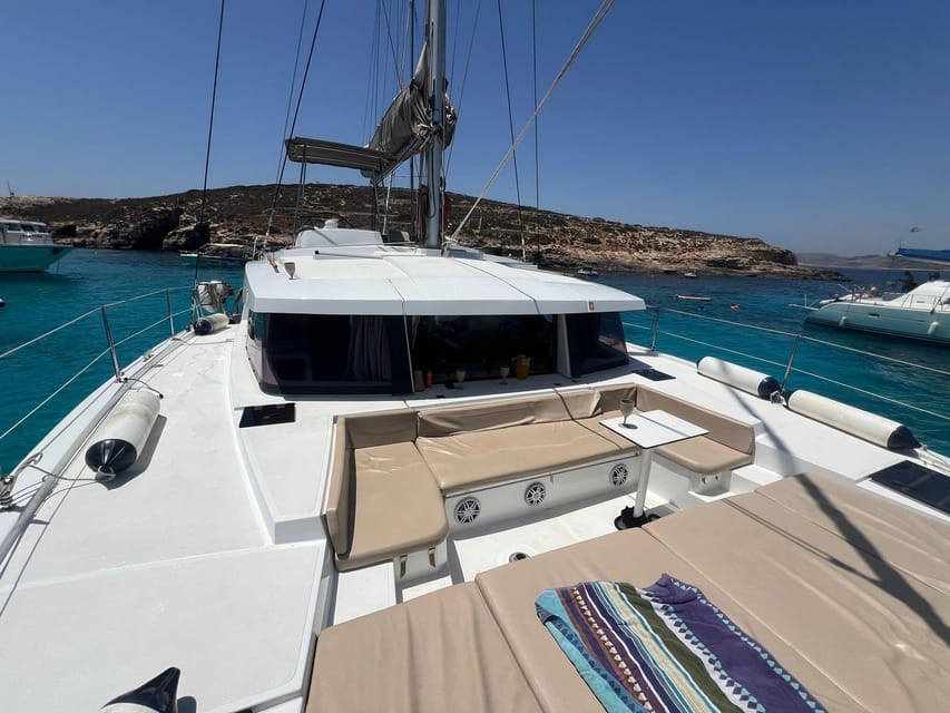 St. Paul's Bay: Half-Day Scenic Catamaran Tour with Drinks - Santa Maria Caves from the water: short stop, good payoff