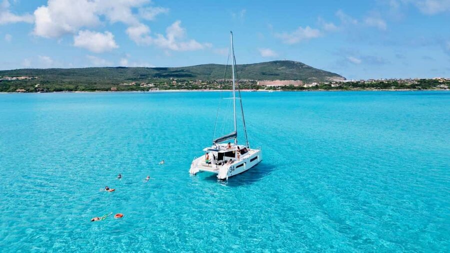 Stintino: Half-day catamaran tour to La Pelosa with aperitif - Key highlights at a glance