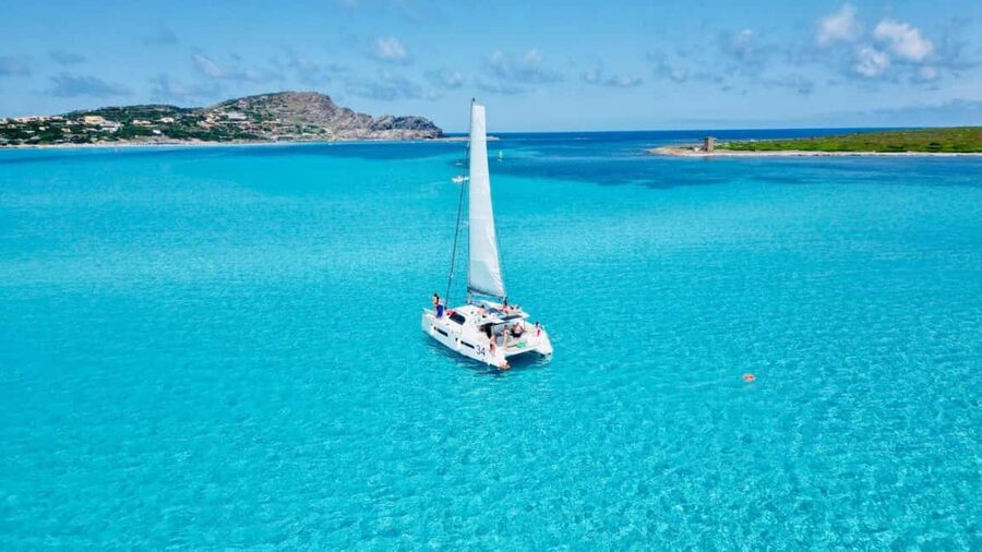 Stintino: Half-day catamaran tour to La Pelosa with aperitif - La Pelosa and Fornelli in 3 Hours: the quick-hit idea