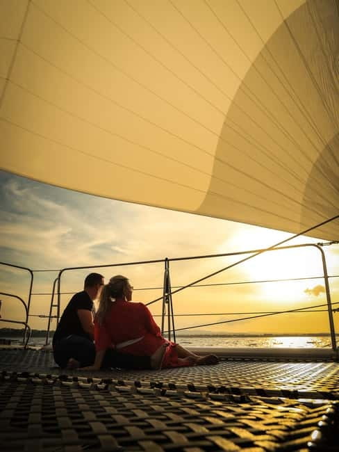 Sunny Beach: Sunset Catamaran Cruise with Dinner & Prosecco - The red London bus pickup, and what boarding feels like