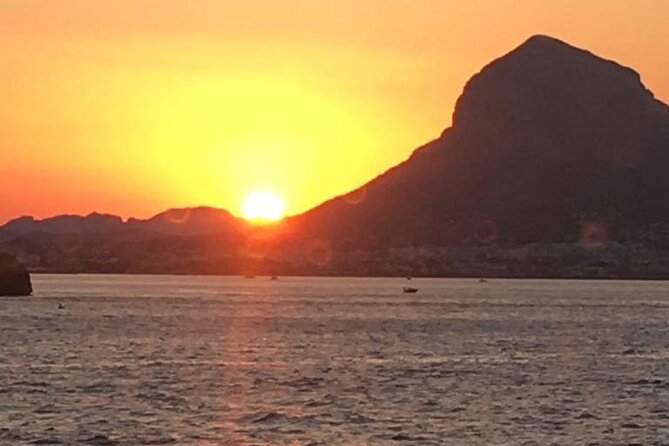 Sunset in Dénia from the Catamaran Mundo Marino - Practical Packing List for a Windy Mediterranean Evening