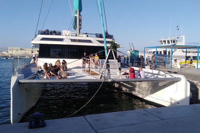 Sunset or night catamaran tour from Malaga - The sunset experience: music, cava, and timing reality