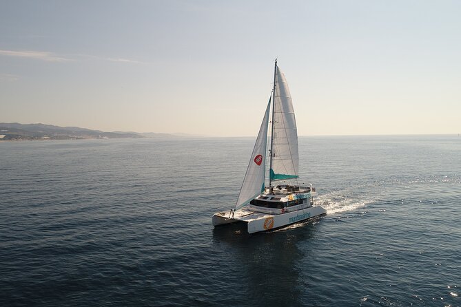 Sunset or night catamaran tour from Malaga - What you see from the deck: Malagueta to Alcazaba and Gibralfaro